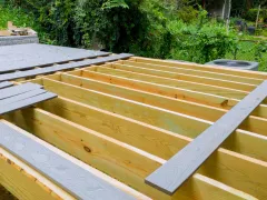 Outdoor living remodeling in Los Angeles featuring deck framing, construction, and backyard renovation