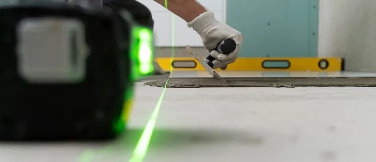 Bathroom remodeling services in Los Angeles showing before renovation condition with bathtub area and unfinished flooring