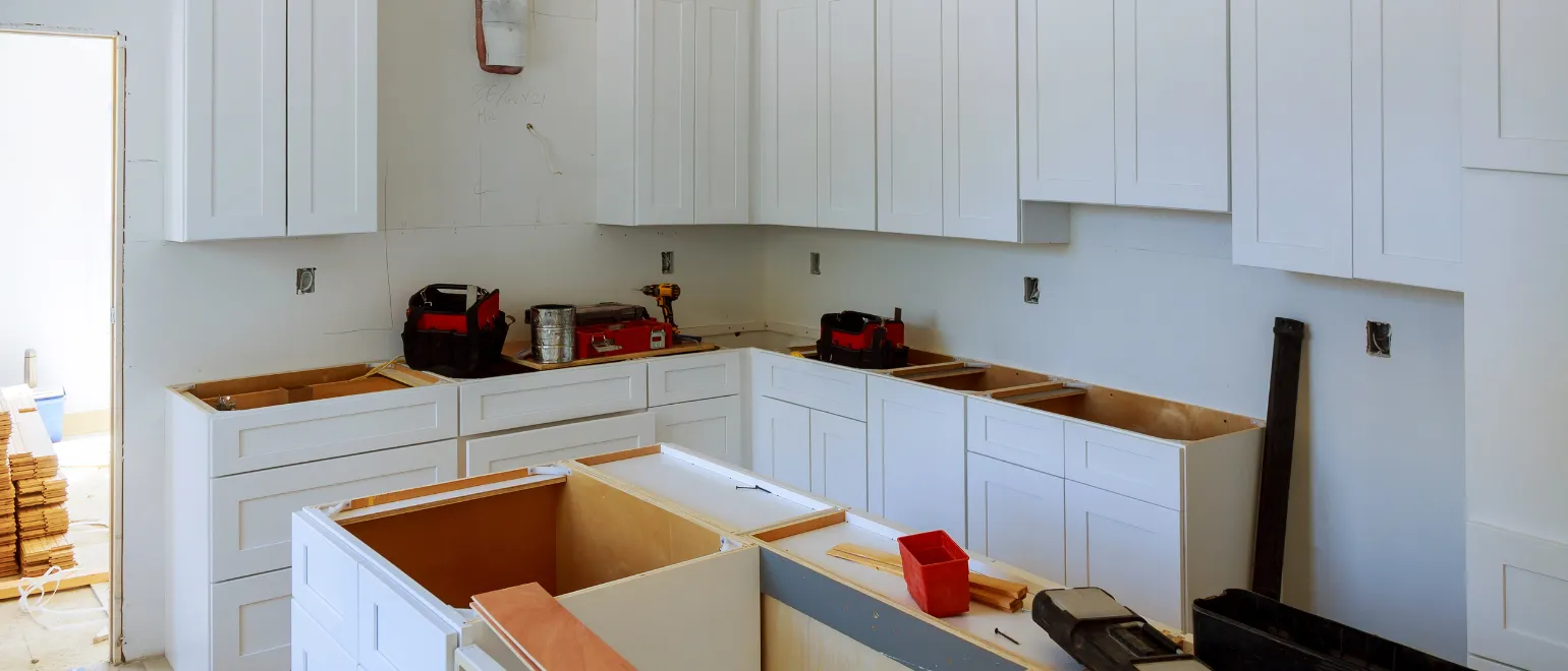 Kitchen remodeling services in Los Angeles featuring cabinet installation, modern kitchen design, and renovation process