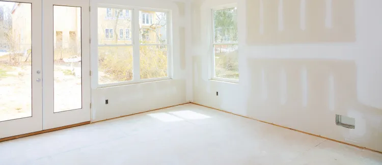 Room additions services in Los Angeles showing new space construction with drywall phase